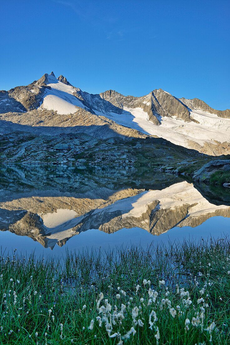 Reichenspitze range reflecting in a mountain lake, Reichenspitze range, Gerlos, Zillertal range, Tyrol, Austria