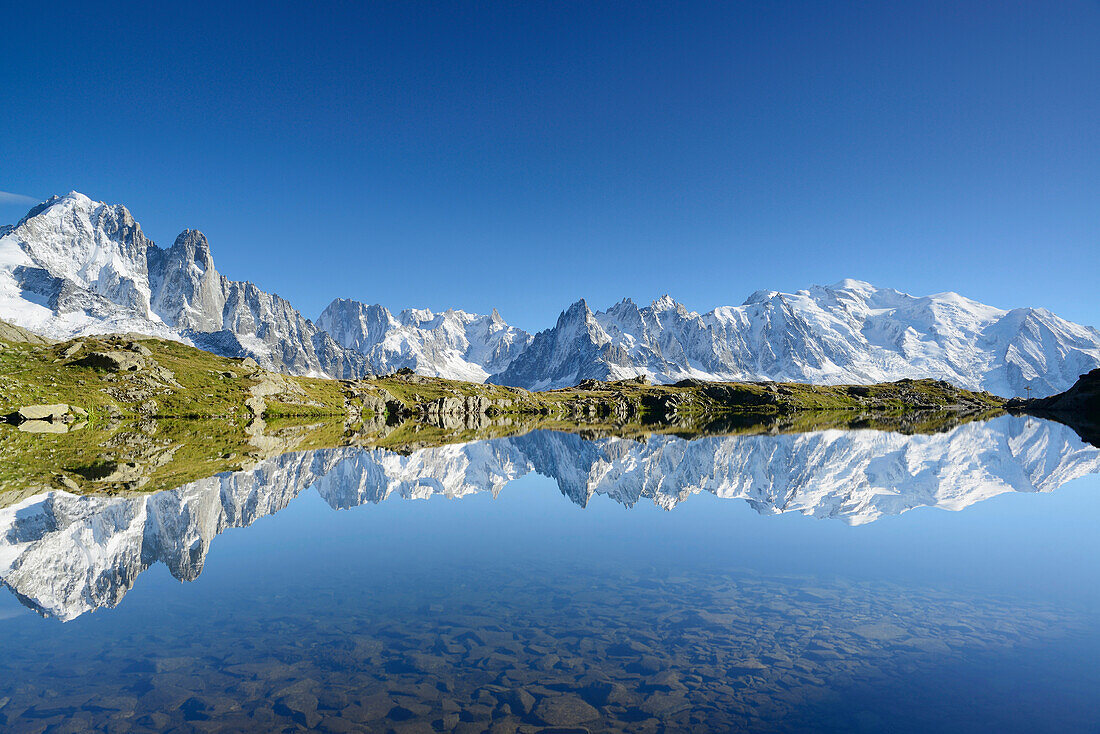 Mont Blanc range reflecting in a mountain lake, Mont blanc range, Chamonix, Savoy, France