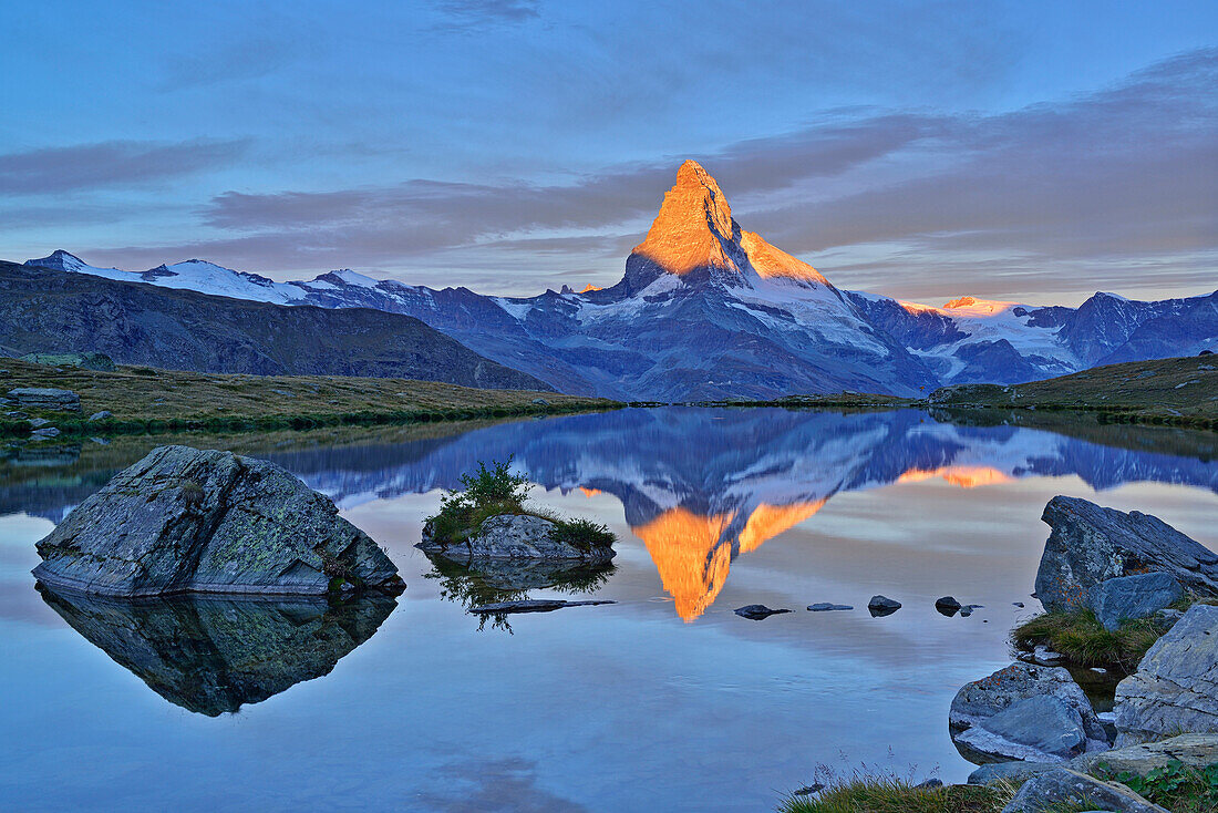 Matterhorn reflecting in a mountain lake, Pennine Alps, Valais, Switzerland