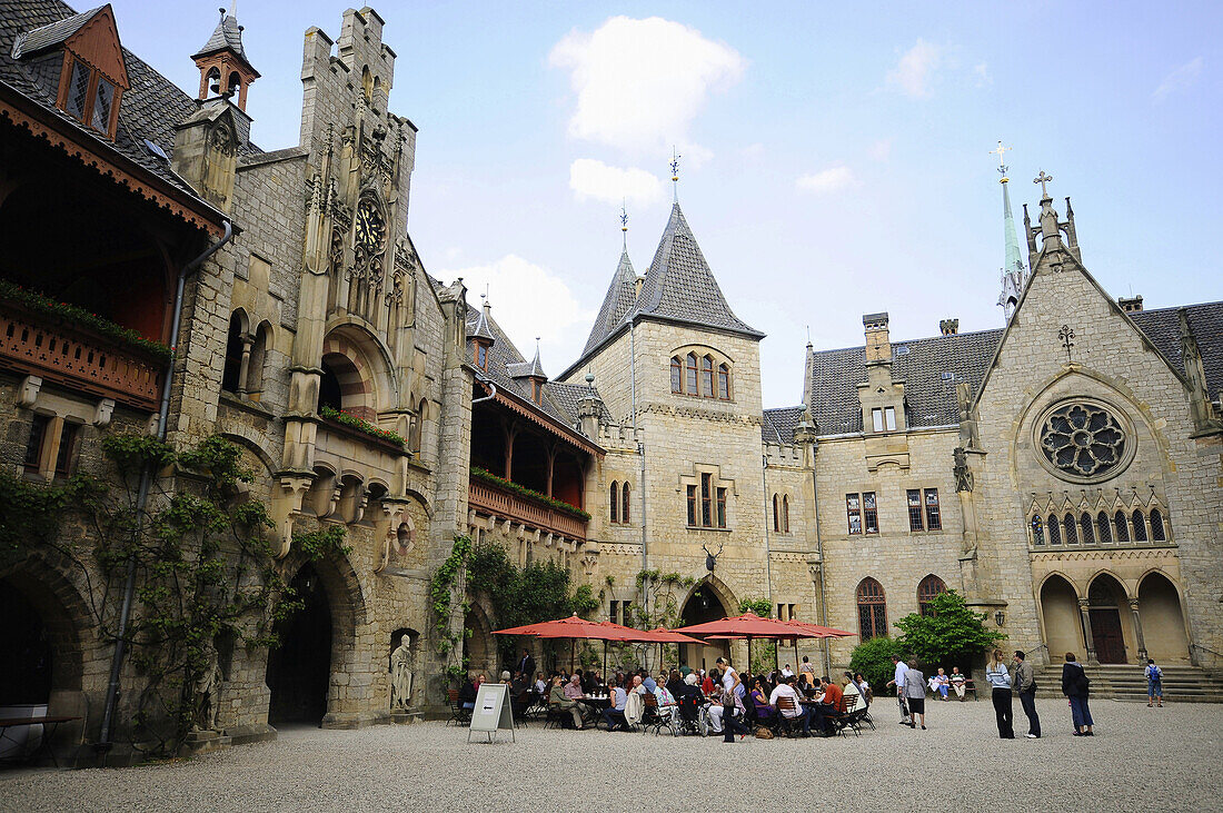People in the inner courtyard of the Marienburg castle, Marienburg, Hildesheim, Lower Saxony, Germany, Europe