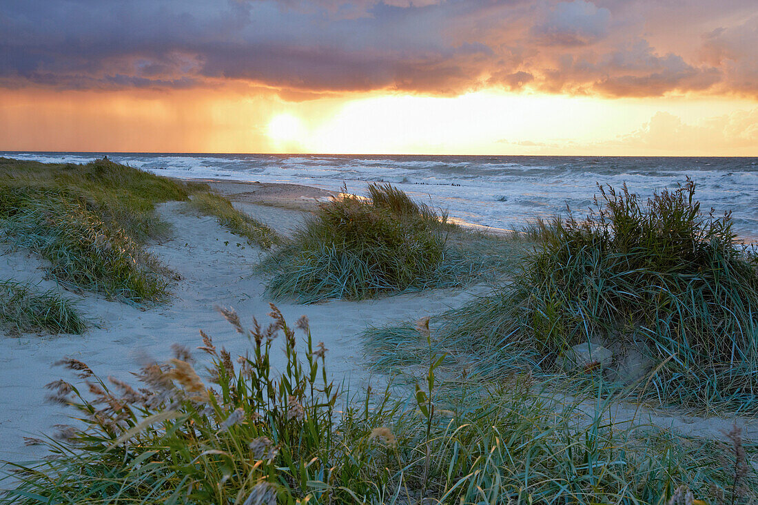 Sunset and rain above Baltic Sea, Baltic coast, Mecklenburg Western Pomerania, Germany, Europe