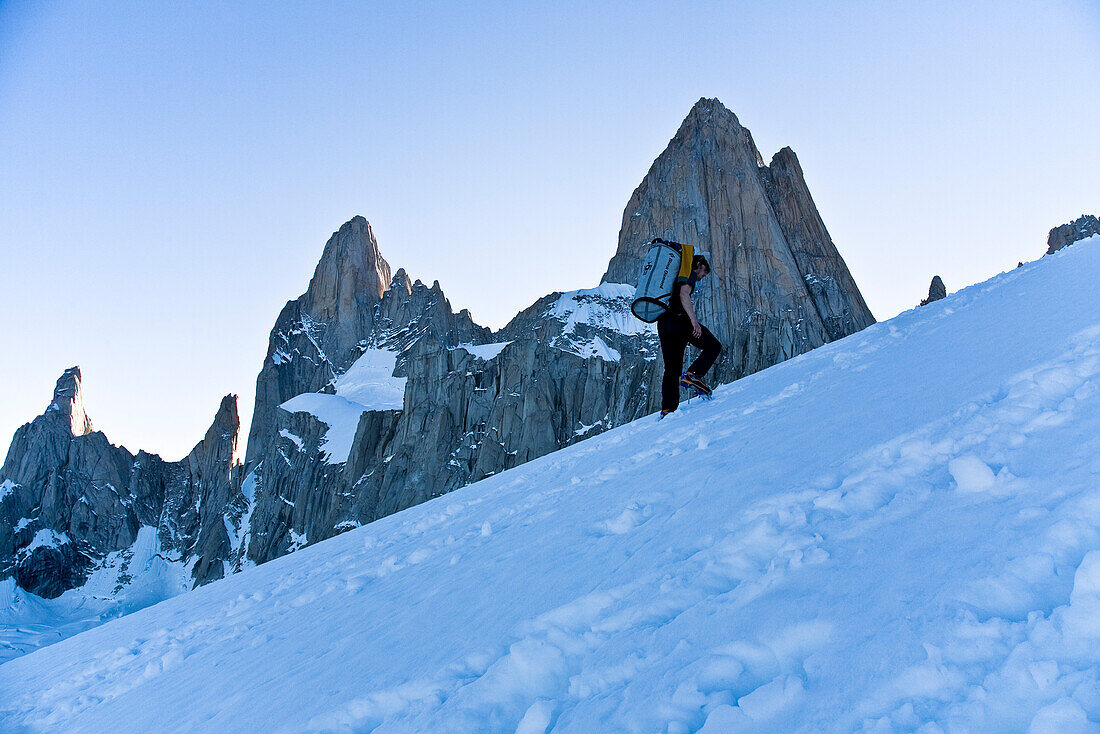 Man ascending to high camp on Passo Superior, Fitz Roy Massif, El Chalten, Patgonia, Argentina