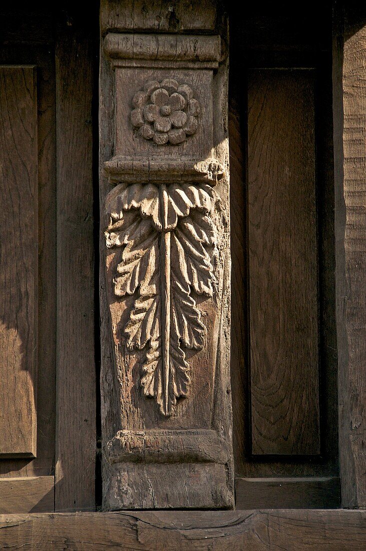 Wood carved detail on medieval mansion, Old Town, Dinan, Brittany, Cotes d´Armor, France