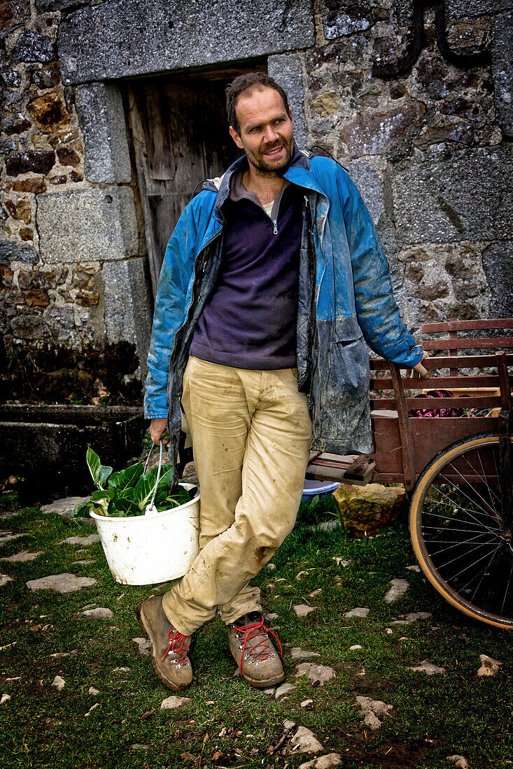 David Fortin In Front Of His House, Organic Market Gardener Living In The Creuse After Being A City Dweller In Bordeaux, France