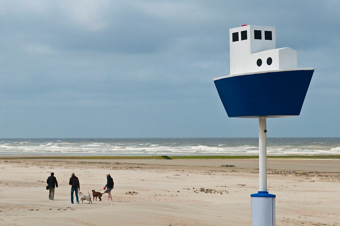 Europe, Belgium, North Sea, Western Flanders, Nieuwpoort, the beach, a miniature boat sailing on the North Sea
