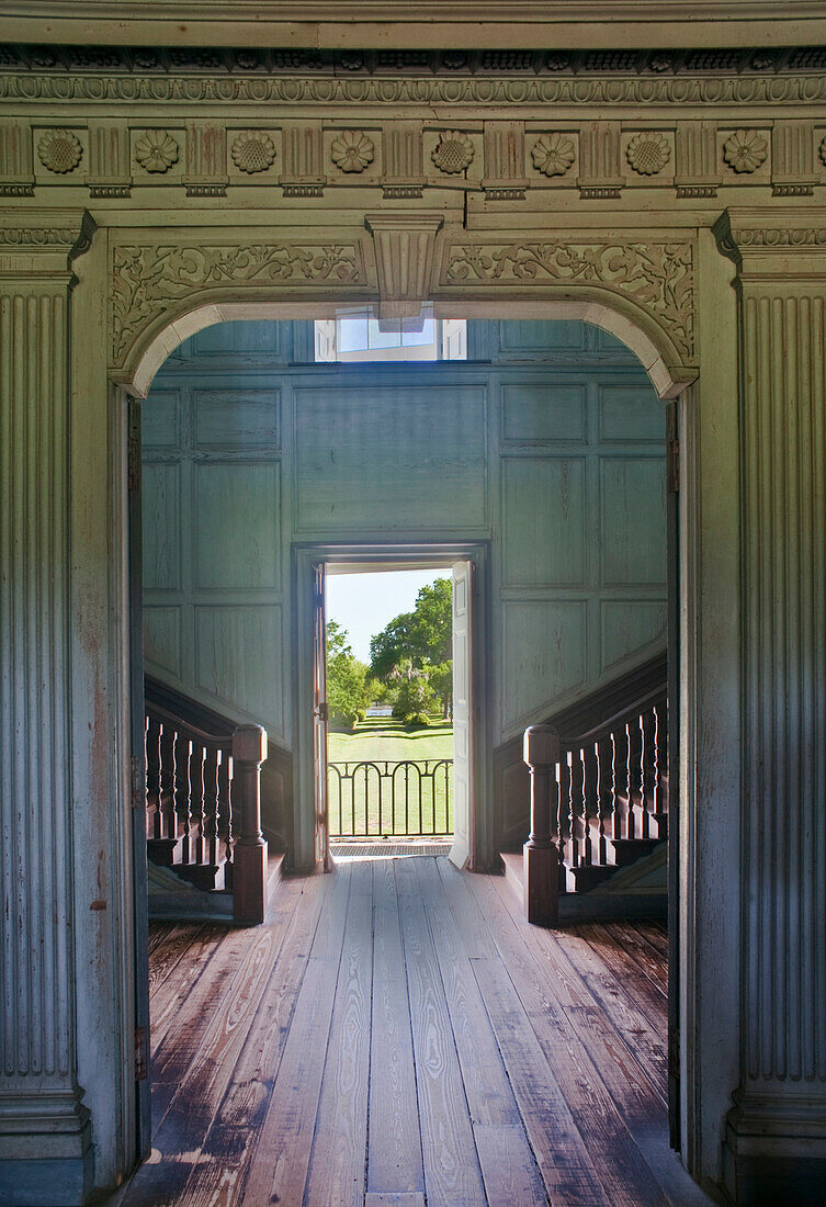 Charleston, Drayton Hall, 18th Century Plantation house. A double staircase, wide entrance hall, and view through an open door. Stately home. Antebellum architecture.