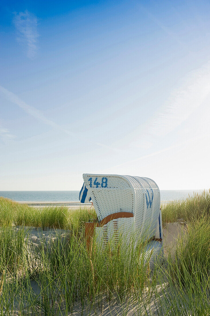 White beachchair, Amrum, North Frisian Islands, Schleswig-Holstein, Germany