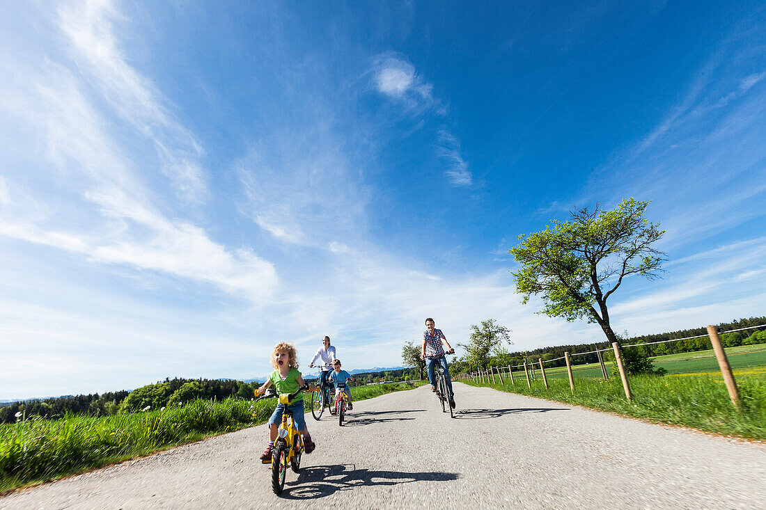 Family cycling, Upper Bavaria, Germany