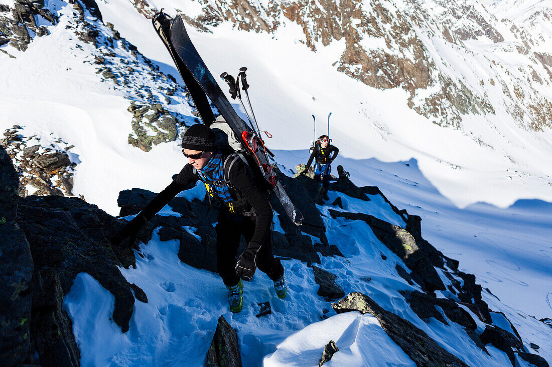 Ski mountaineers on the summit ridge of Schoentalspitz, Sellrain, Innsbruck, Tyrol, Austria