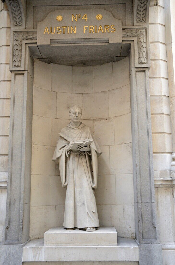 Statue of a friar outside number 4 Austin Friars EC2, London, UK