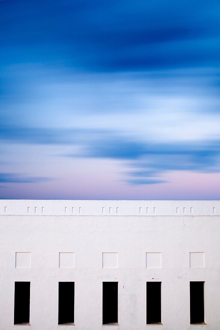 Moving clouds over a building  Long exposure shot