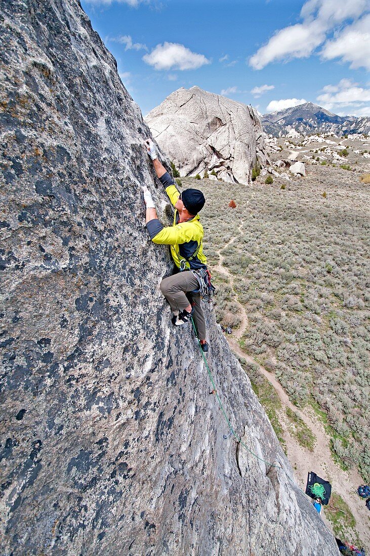 Rock climbing a route called Conceptual Reality which is rated 5,9 and located on The Gallstone at The City Of Rocks National Reserve near the town of Almo in southern Idaho