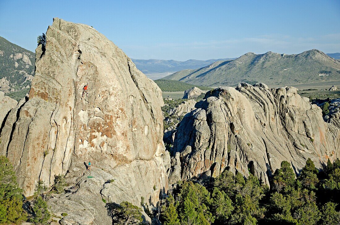 Elijah Weber rock climbing Swiss Cheese which is rated 5,7 and located on the Anteater at The City Of Rocks National Reserve near the town of Almo in southern Idaho