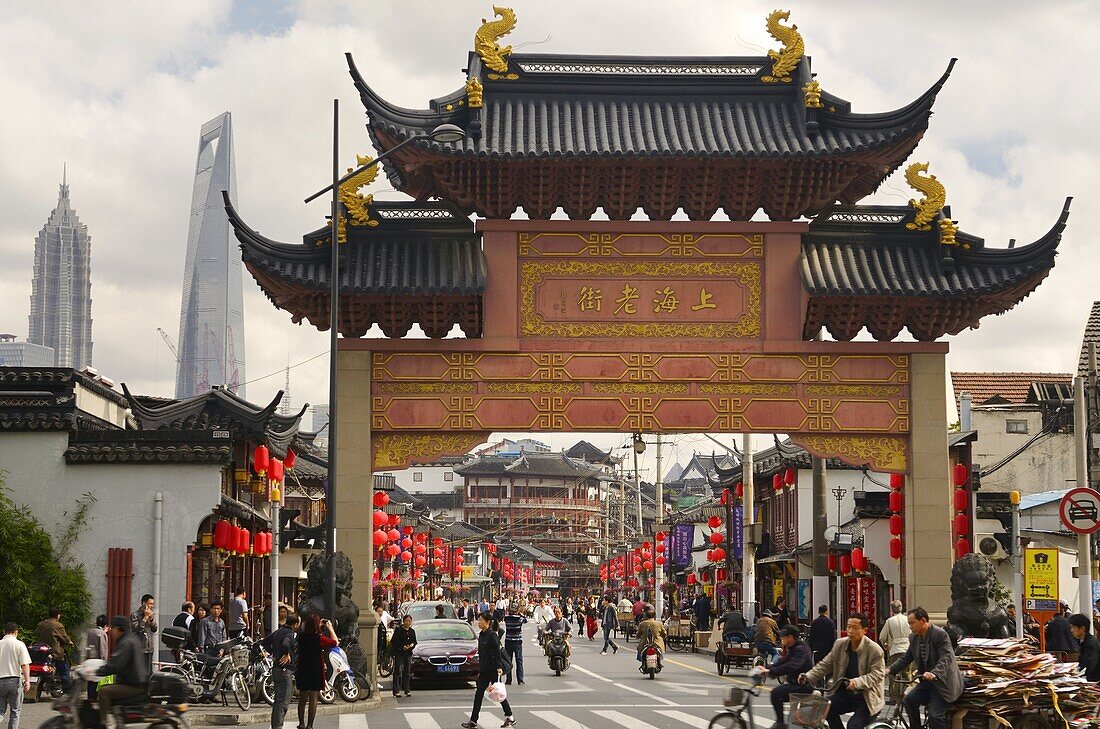 Busy Fangbang traffic at Old Town Gate intersection of South Henan road Hangpu District Shanghai China