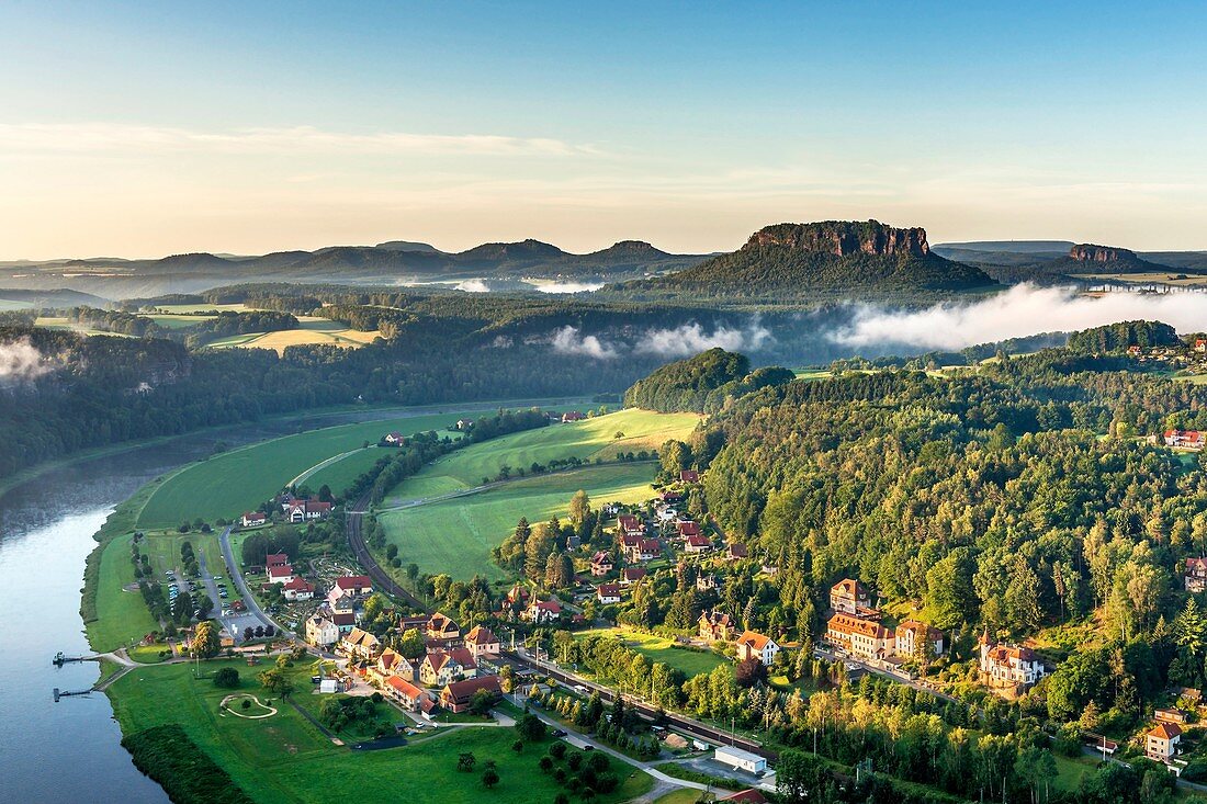 View to the Table Mountain Lilienstein in the national park Saxony Switzerland He is one of the most striking mountains in the Elbe Sandstone Mountains In front is the health resort Rathen Oberrathen at the Elbe River, Saxony, Germany, Europe