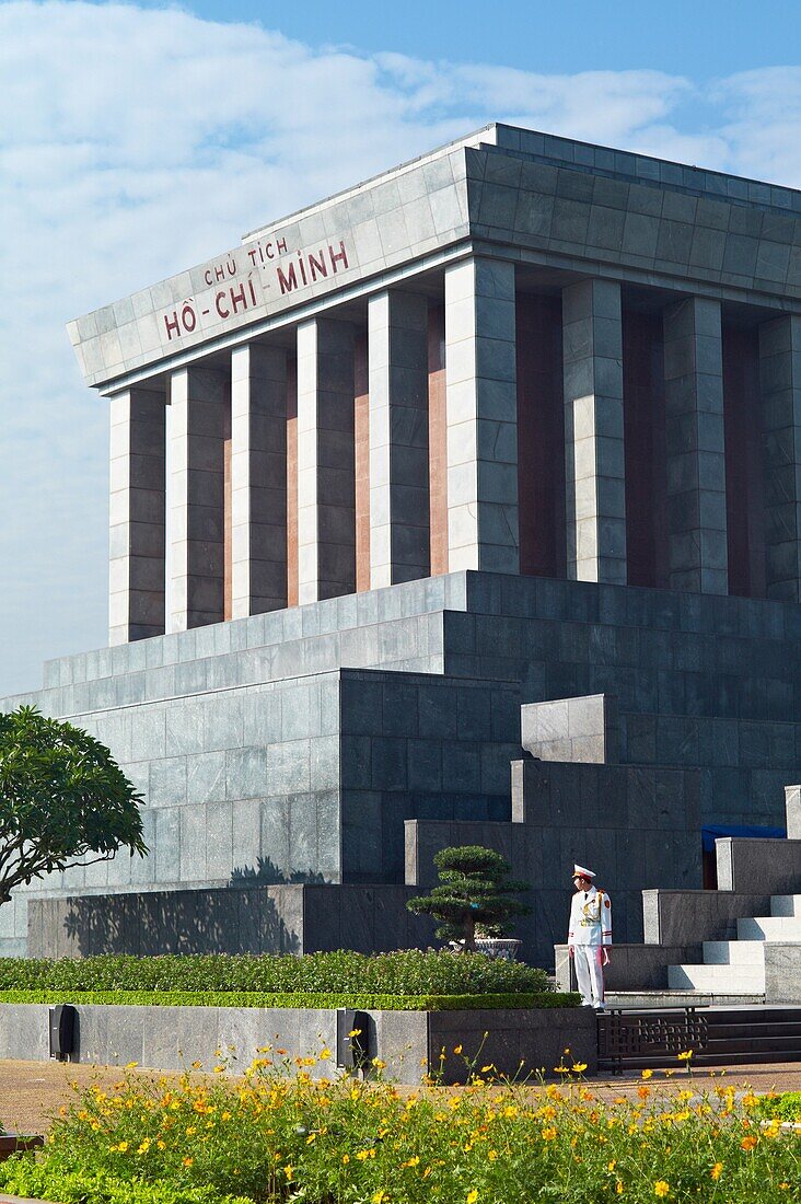 A guard standing in front of the Ho Chi Minh Mausoleum