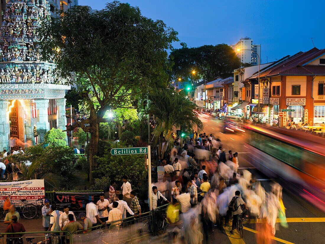 People walking along the roads in Little India at night with an Indian temple on the left  Little India in Singapore, a focal gathering point for Indians local and foreign  Foreign indians, who make up a sizable proportion of foreign labour in Singapore g