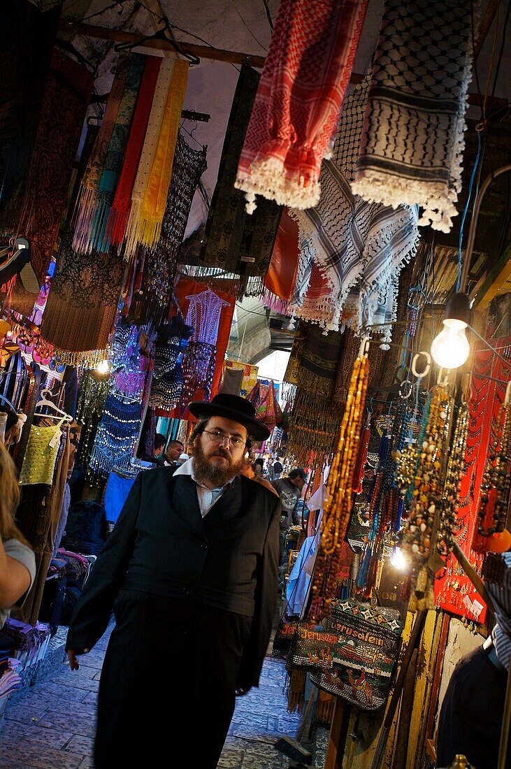 Orthodox Jew, Souk Arabic market in the Palestinian area of Jerusalem  Israel.