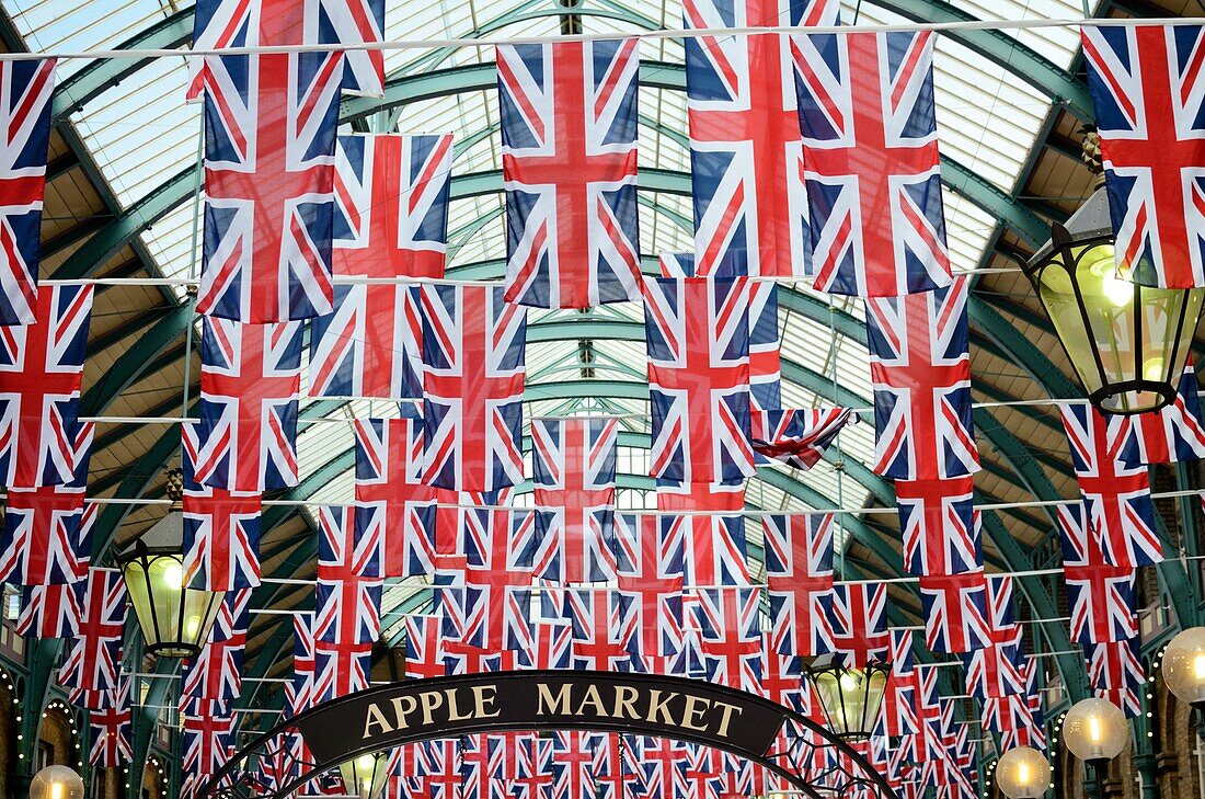 Union Jack flags in the former Covent Garden Market building, London, UK