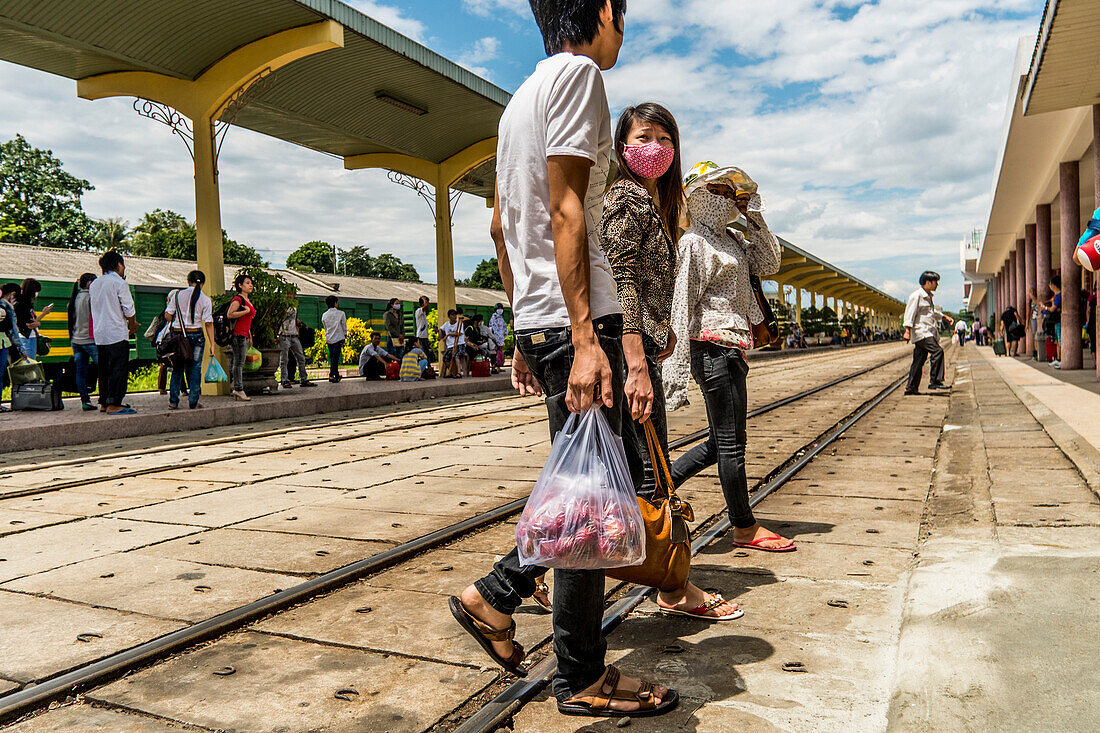 Young Vietnamese people at Hue railway station, Vietnam, Asia