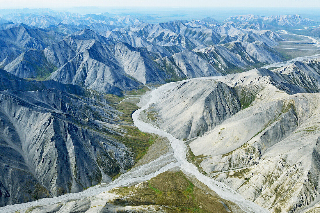 Aerial of the rugged Philip Smith Mountains portion of the Brooks Range in ANWR, Arctic Alaska, Summer, HDR