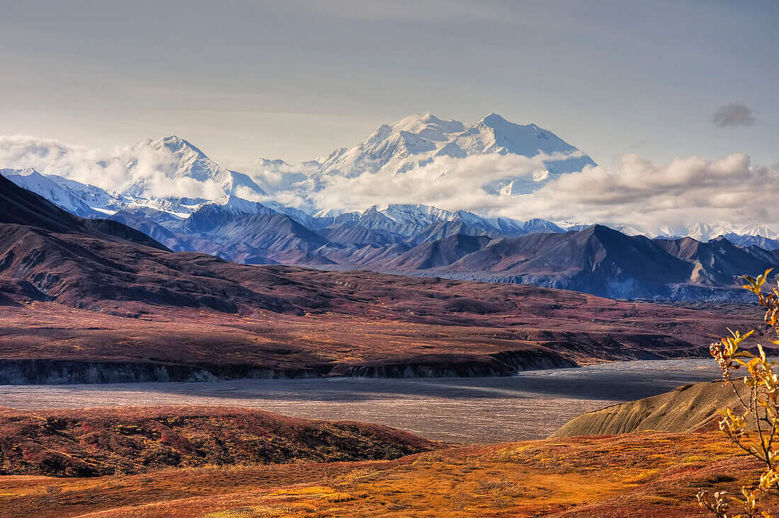 Scenic view of Mt. McKinley with colorful Autumn tundra in the foreground, Denali National Park, Alaska, HDR image