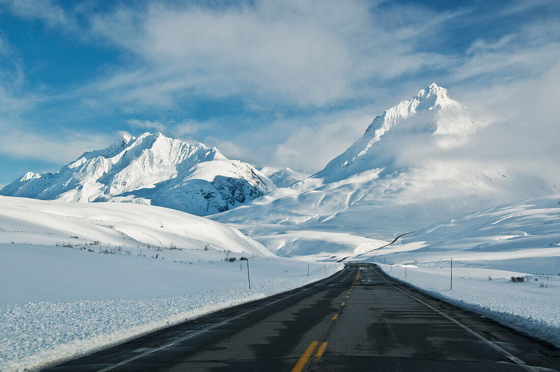 View of the Haines Highway, or Haines Cut-Off, at the base of the Alsek Range in Tatshenshini-Alsek Wilderness Provincial Park, British Columbia, Canada, Winter