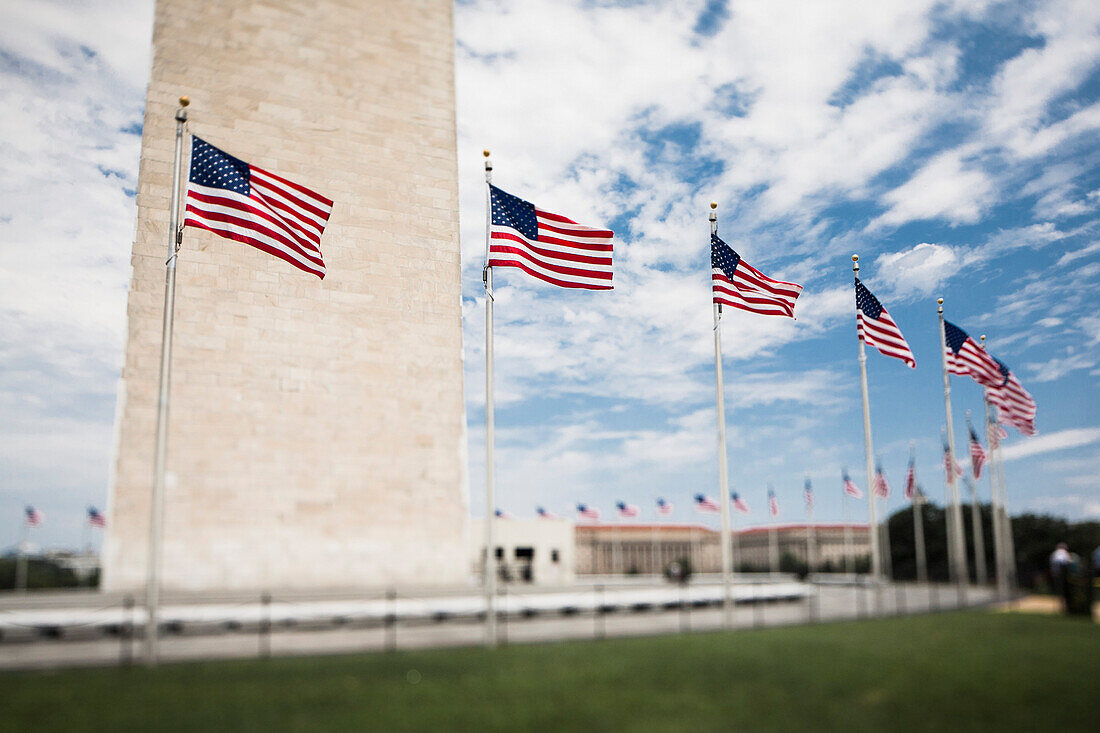 Curved Row of American Flags Surrounding Washington Monument, Washington, DC, USA
