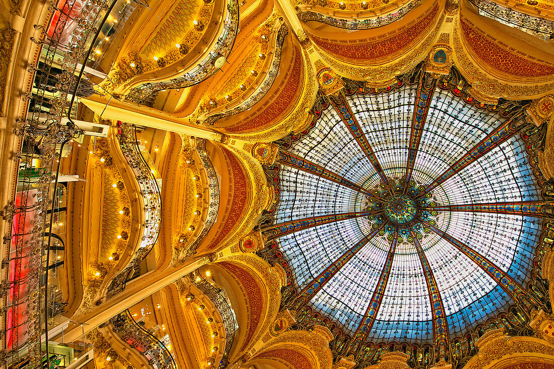 The stained glass dome of Galleries Lafayette, a large opulent art nouveau and historic department store in the centre of Paris