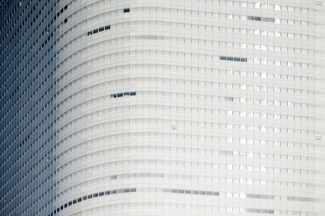 A modern hotel, a tall skyscraper in the Ginza District of Tokyo.