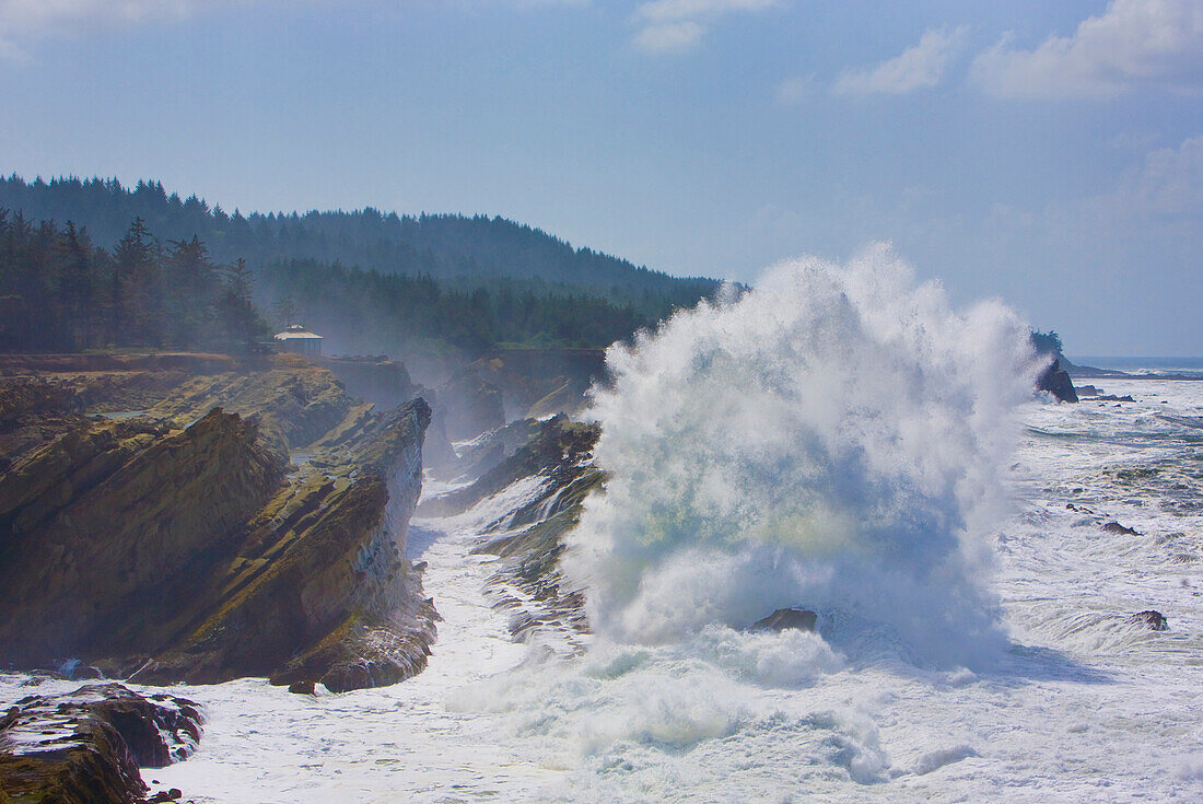 Cape Arago on the Central Oregon Coast, High waves crashing against the cliffs and sea stacks