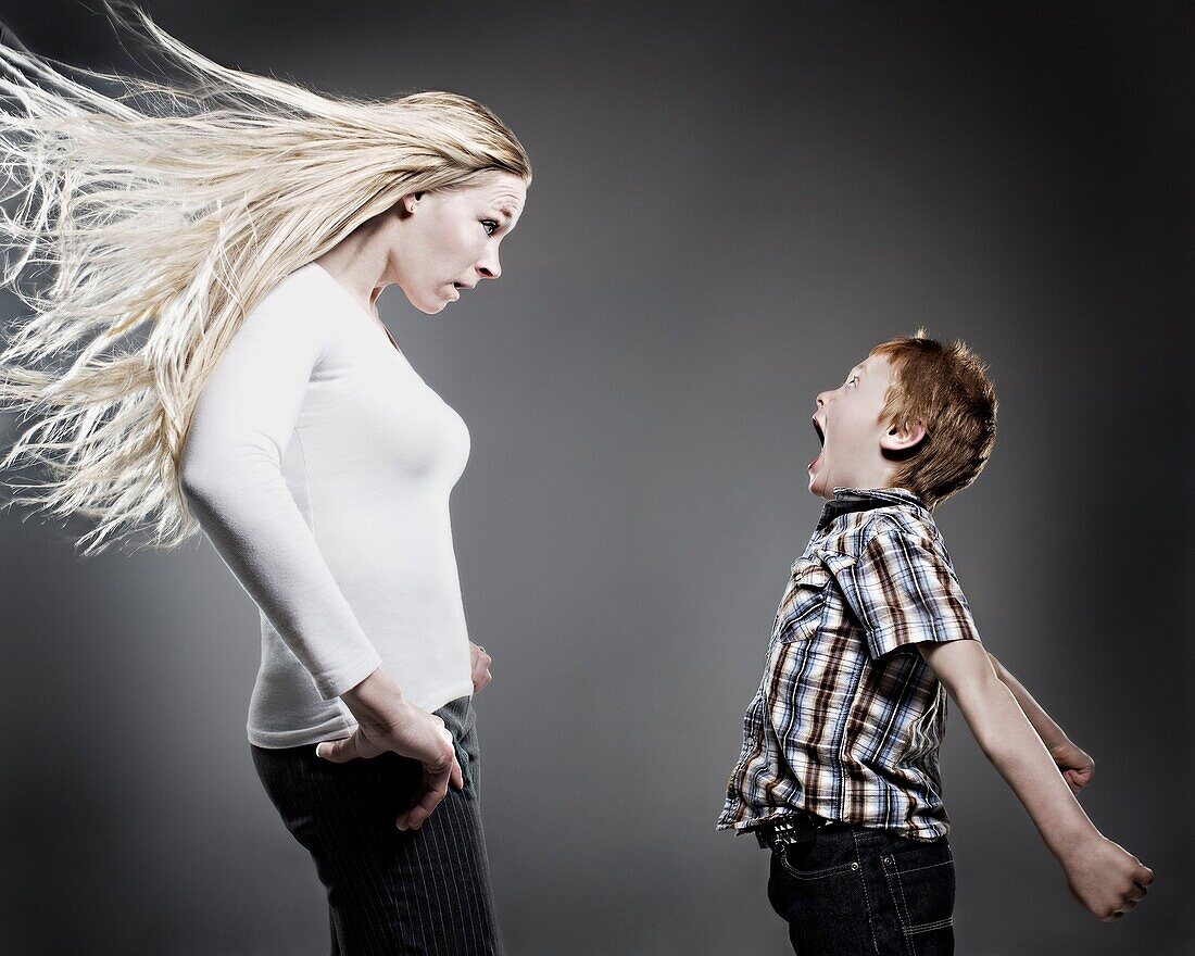 Boy Yelling At His Mother As Her Hair Blows Wildly