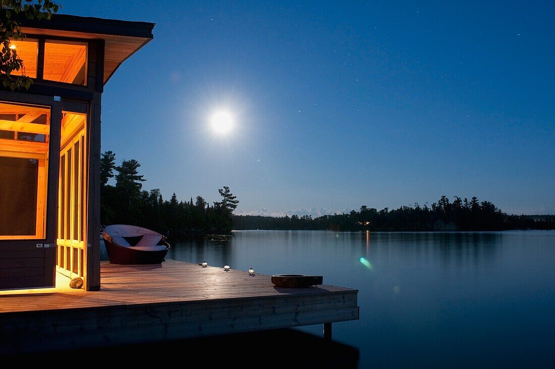 Lake Of The Woods, Ontario, Canada, Cabin Along The Lake At Night