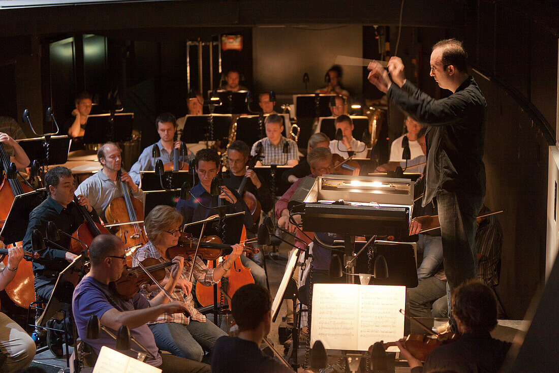 Orchestra with conductor in Brunswick State Theatre, Theater and Opera house, Brunswick, Lower Saxony, Germany