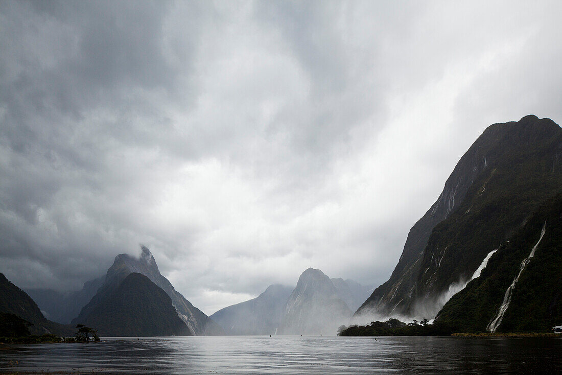 blocked for illustrated books in Germany, Austria, Switzerland: Milford Sound after rain, after a storm, dramatic cloud formation, Fiordland National Park, South Island, New Zealand