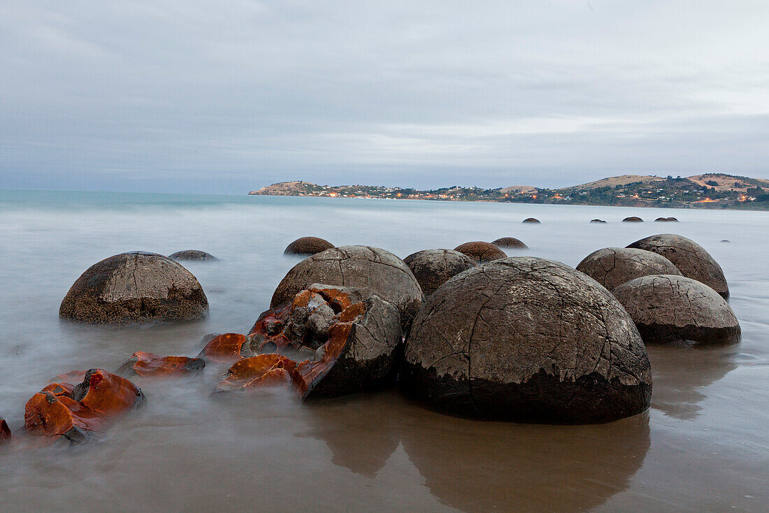 blocked for illustrated books in Germany, Austria, Switzerland: Moeraki Boulders, large, spherical concretions on the beach, stone ball, Moeraki, Otago, South Island, New Zealand