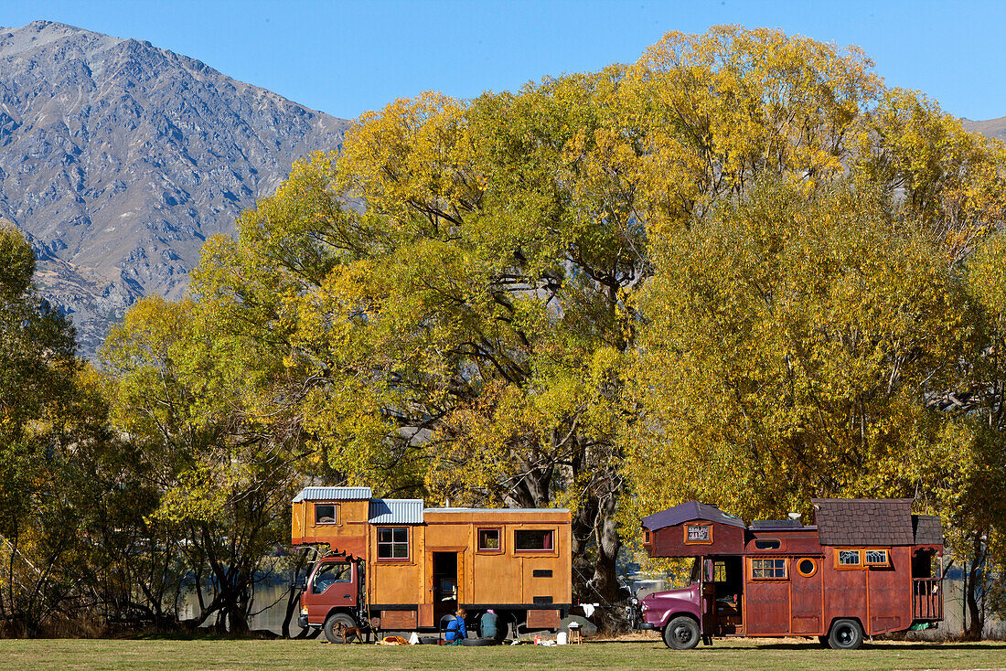 blocked for illustrated books in Germany, Austria, Switzerland: Wooden house trucks at Lake Hayes, alternative way of life, Lake Hayes, Otago, South Island, New Zealand