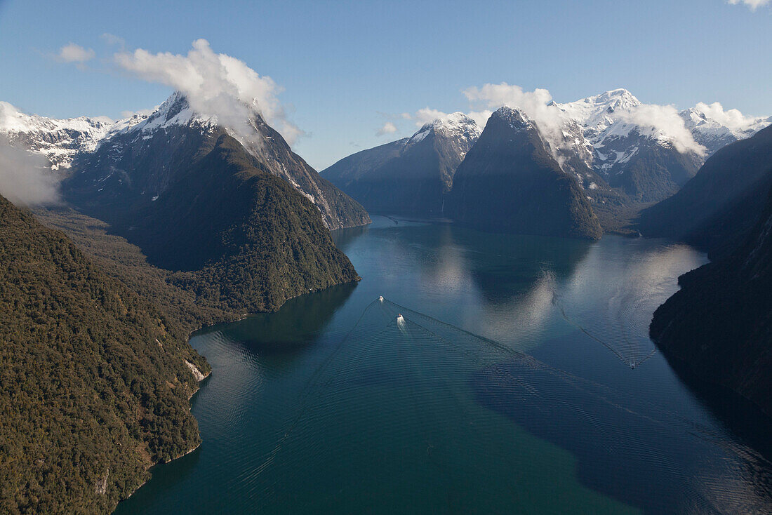 Aerial view of Milford Sound with the snowcapped mountain of Mitre Peak, Milford Sound, Fiordland National Park, South Island, New Zealand