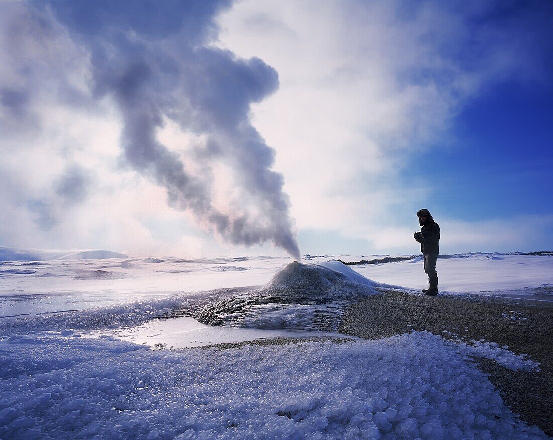 Geologist at Oskurholshver, hot spring at Hveravellir, Iceland