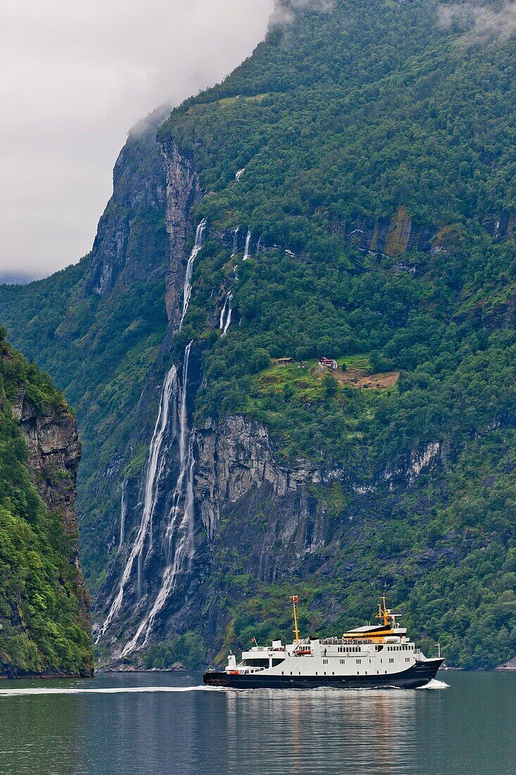Cruise ship by Seven Sisters Waterfalls on Geirangerfjord, Norway