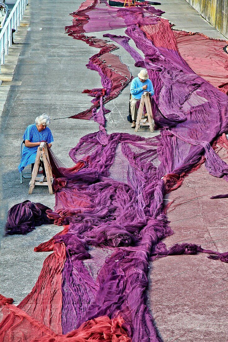 Sewing nets at Lastres, Asturias, Spain