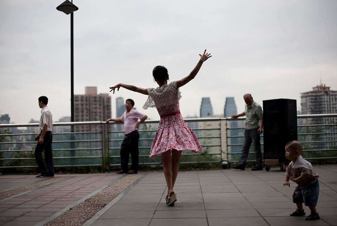 Woman Dancing in Park, Chongqing, China