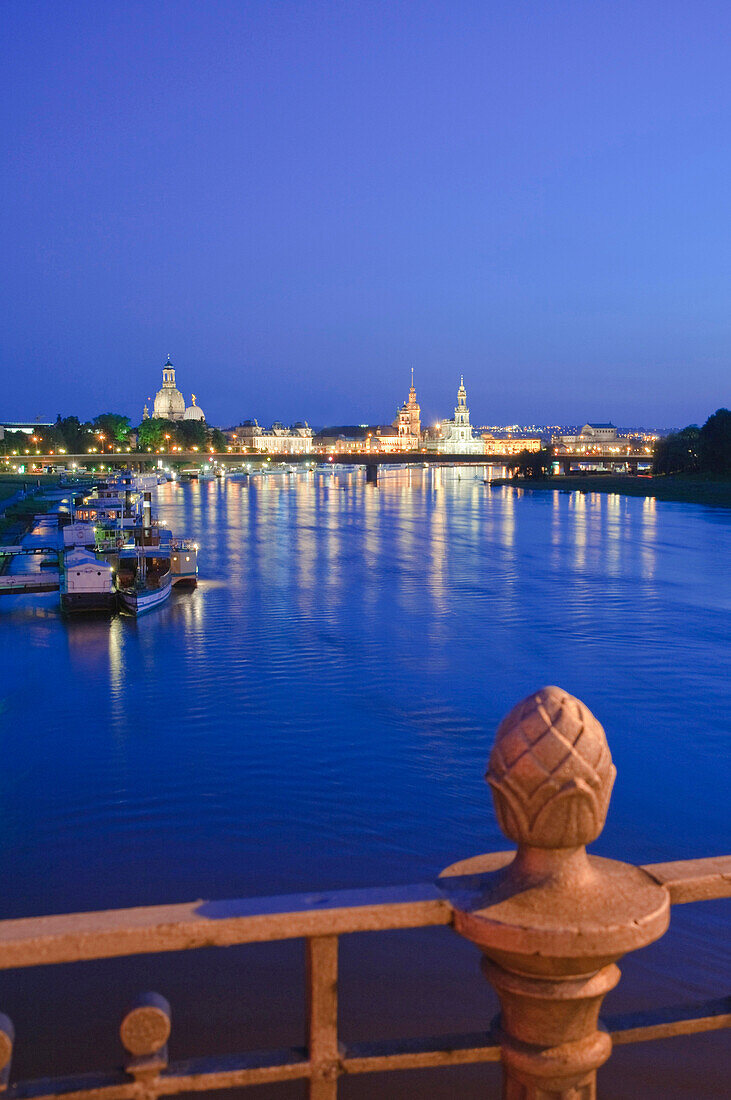 View over the river Elbe towards the barock historic city of Dresden at night, Bruehls Terrace and Frauenkirche, Dresden, Saxony, Germany