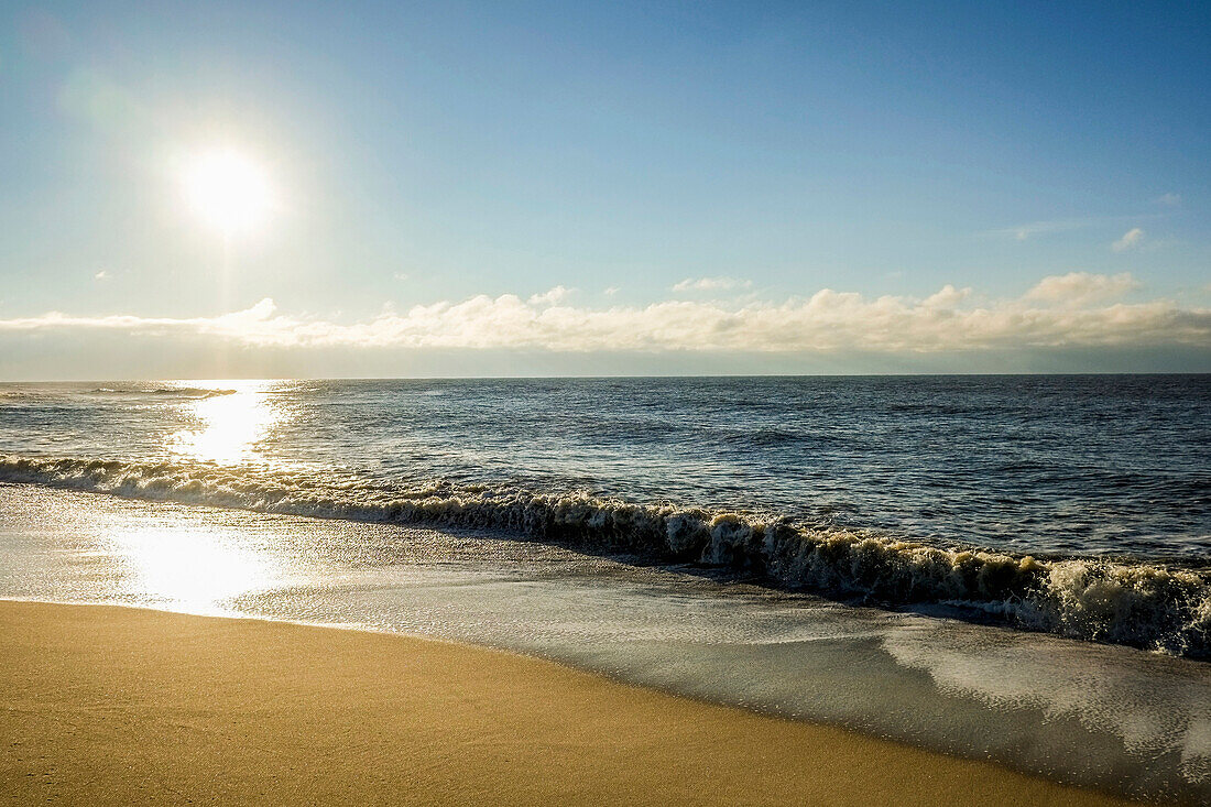 Water spray and waves at the beach of Rantum, island of sylt, north germany, germany