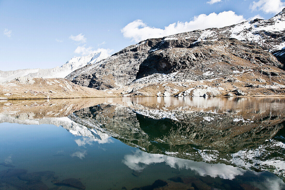 Water reflection of the Hochgall, Lake Maler, Kassler Hut, Rain in Taufers, Bozen, South Tirol, Italy