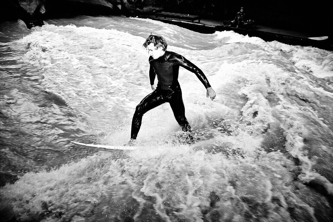 Man surfing on Eisbach, English Garden, München, Bavaria, Munich