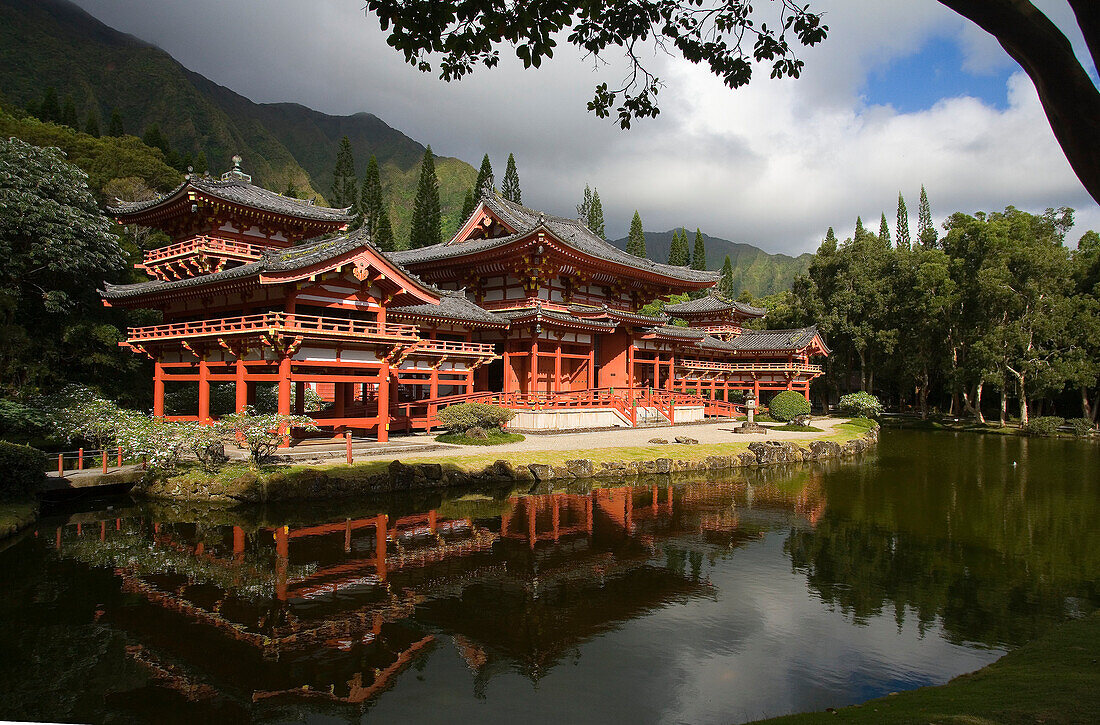 Hawaii, Oahu, Ahuimanu Valley, Valley of the Temples, Byodo-In Temple, reflection in pond.