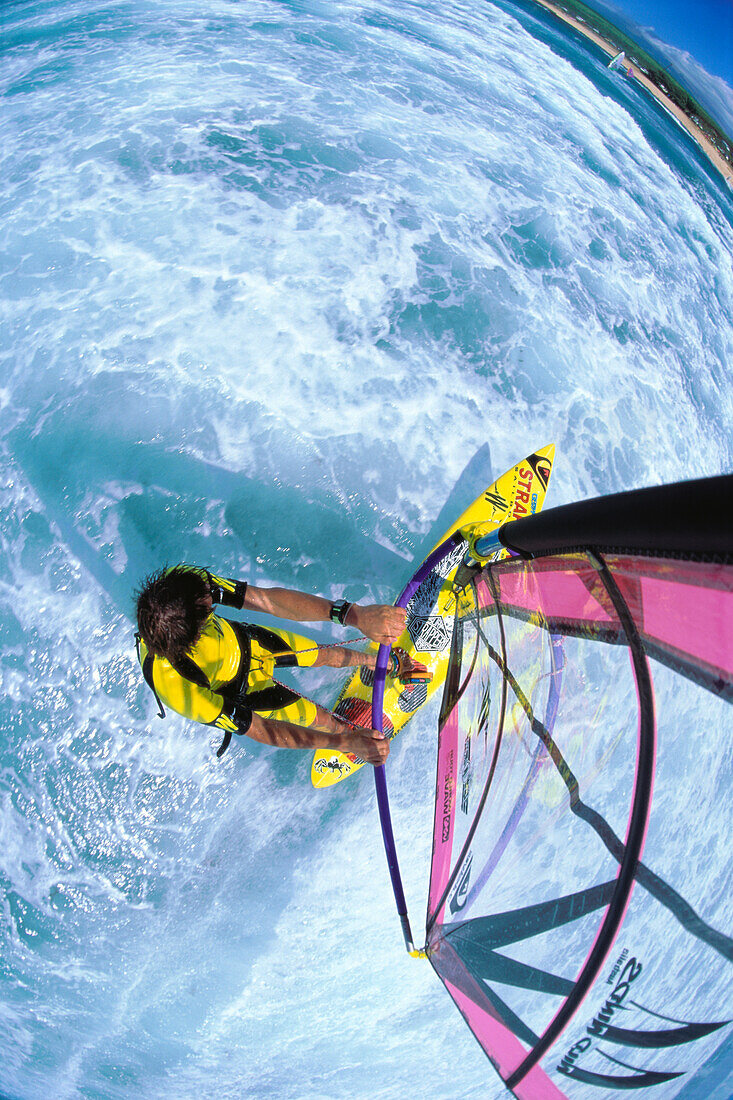 Hawaii, Maui, Ho'okipa, Jason Polakow in whitewash, mast mount wide angled view