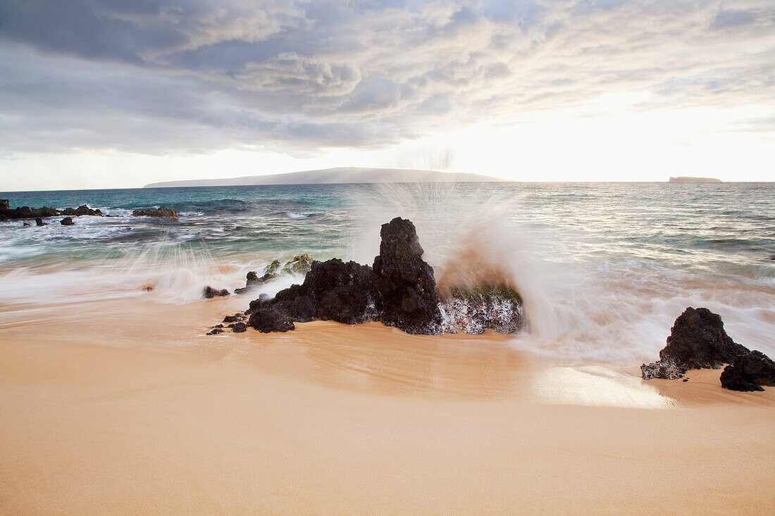Hawaii, Maui, Surf crashes onto Big Beach.