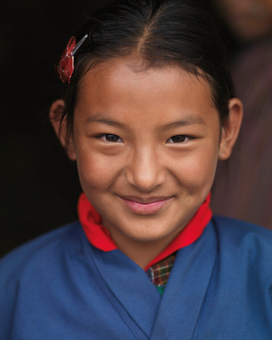 'A Young Girl In A Blue Robe At The National Memorial Chorten; Thimphu Thimphu District Bhutan'
